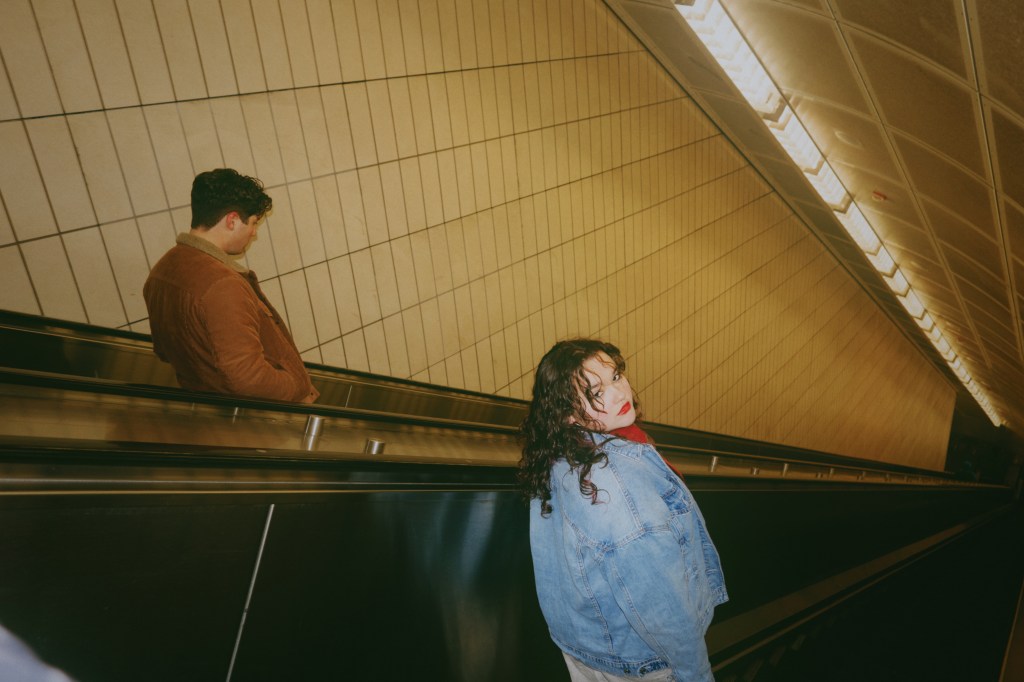 Kyra Soto on the stairs leading to the subway