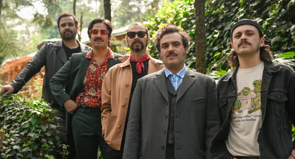 The members of the band Enjambre