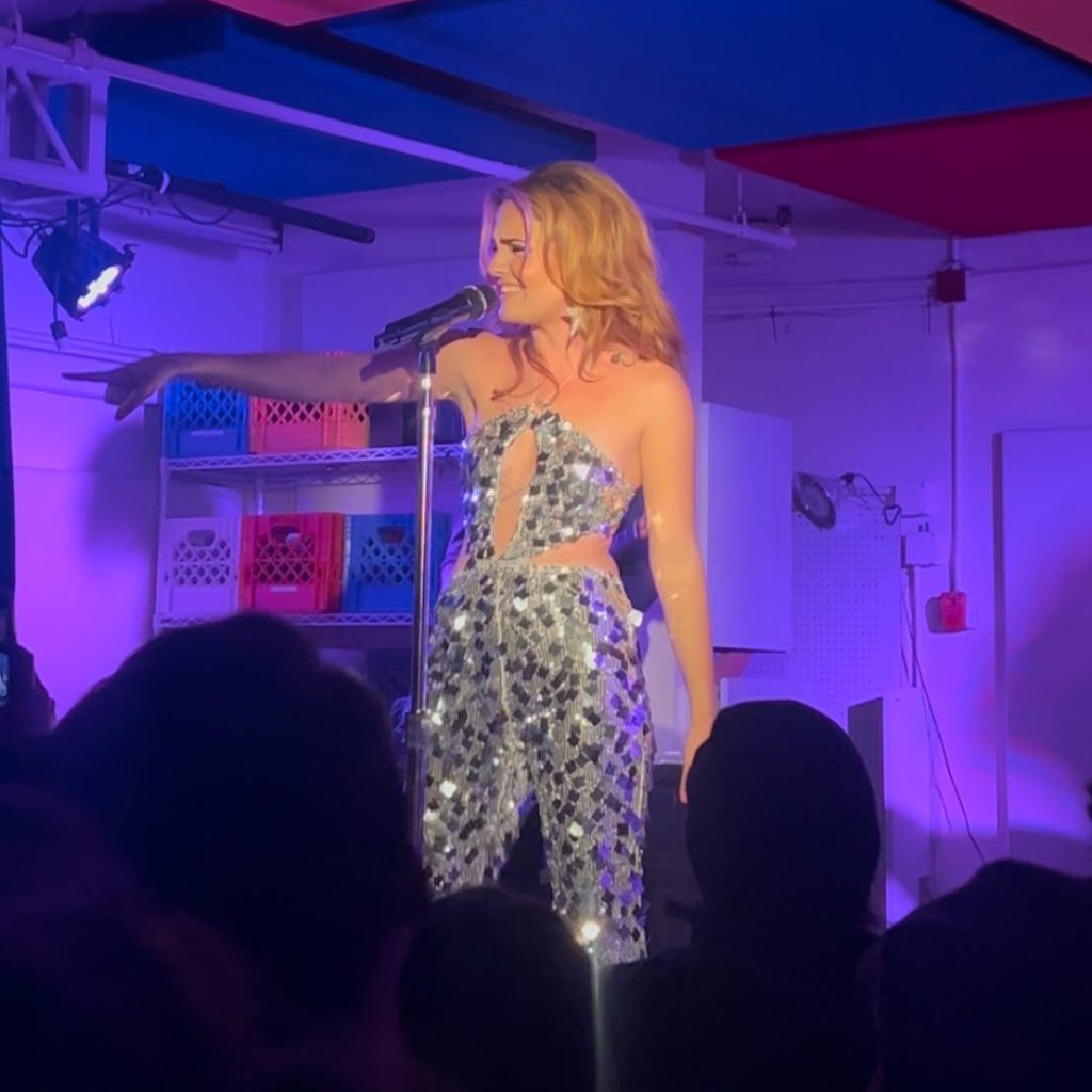 Avery Cochrane singing to fans in New York City